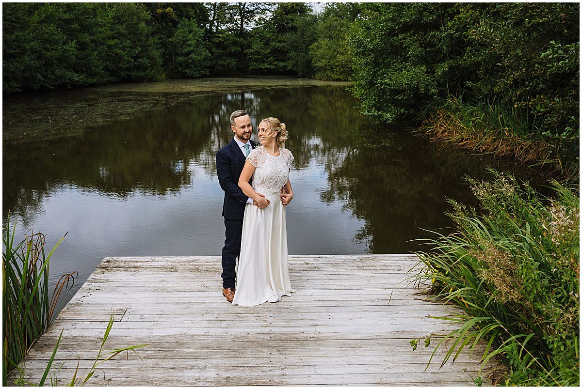 stunning lakeside wedding portraits at cheshire's styal lodge