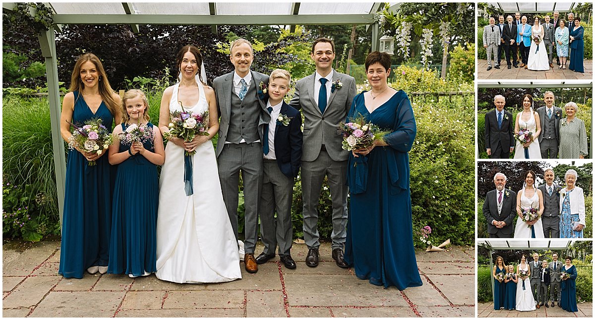 A joyful wedding party poses together in a beautiful garden, showcasing the bride in a white gown, bridesmaids in teal dresses, and family members.