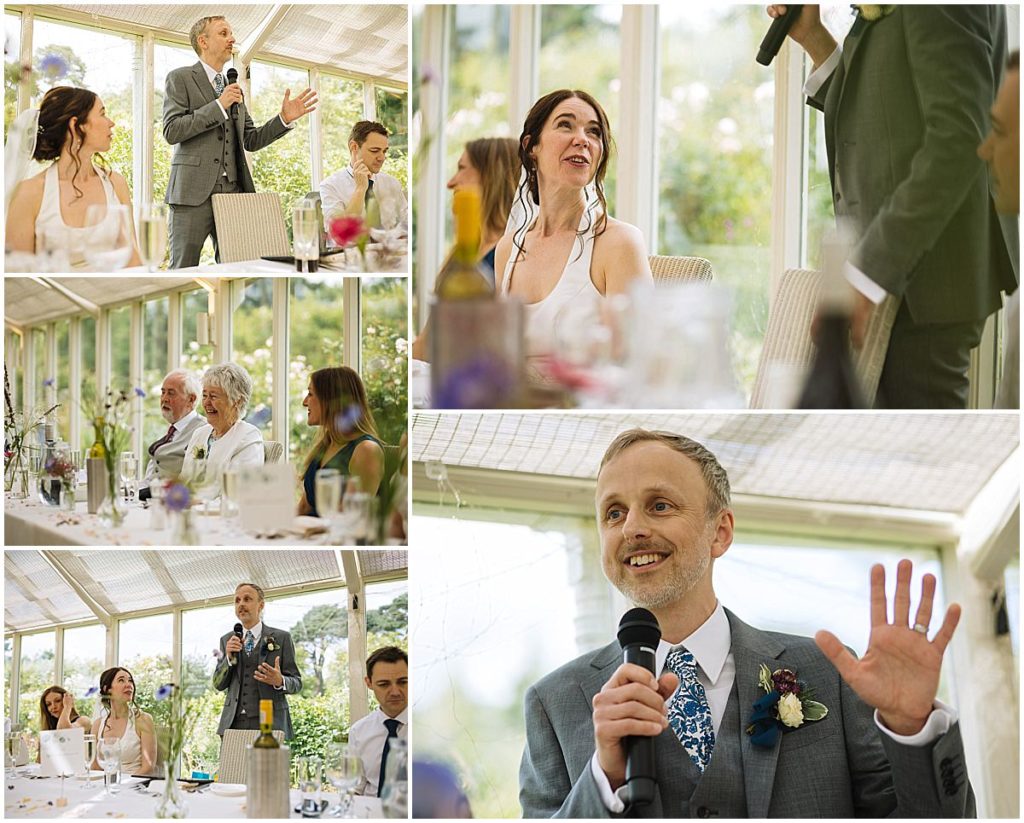 Guests enjoying heartfelt speeches in a bright, floral-themed venue, capturing moments of laughter and emotion.